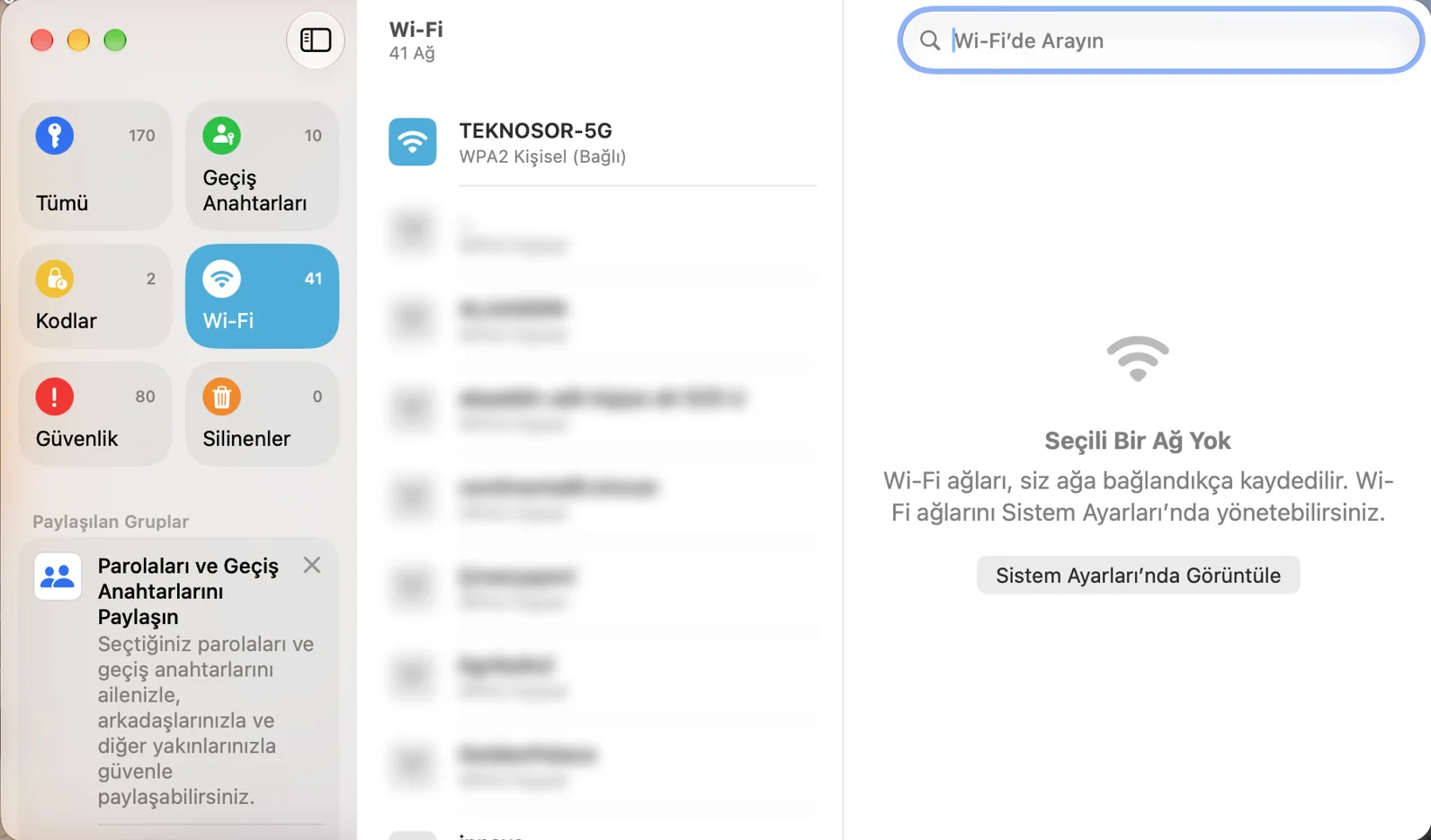Mac Parolalar uygulamasında Wi-Fi sekmesinin görüntüsü ile iPhone Wi-Fi Şifresi Öğrenme